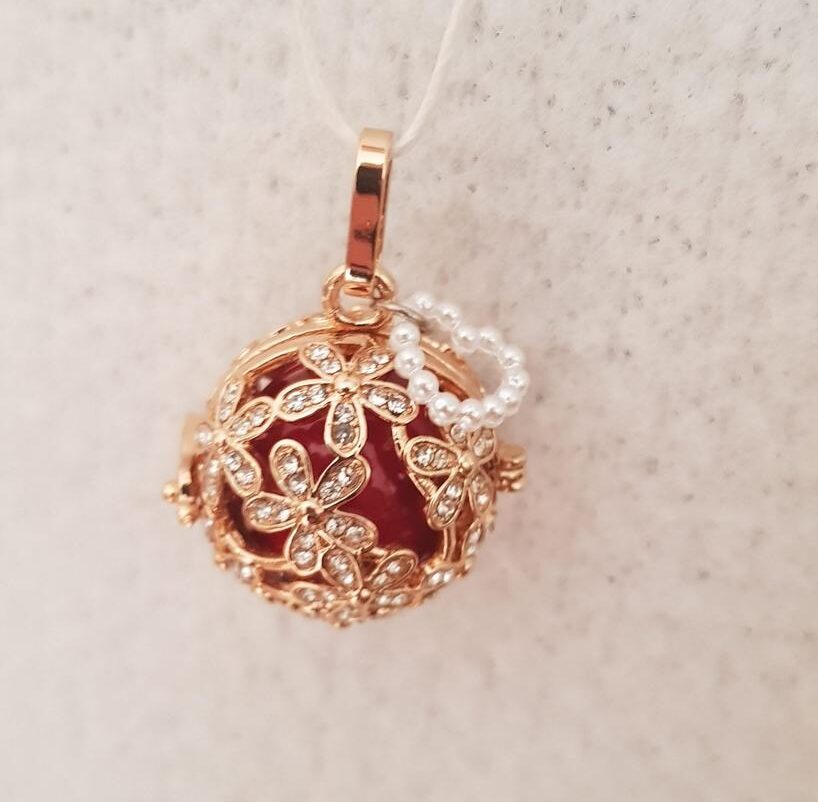 Collier doré cœurs transformable – Fleur nacrée