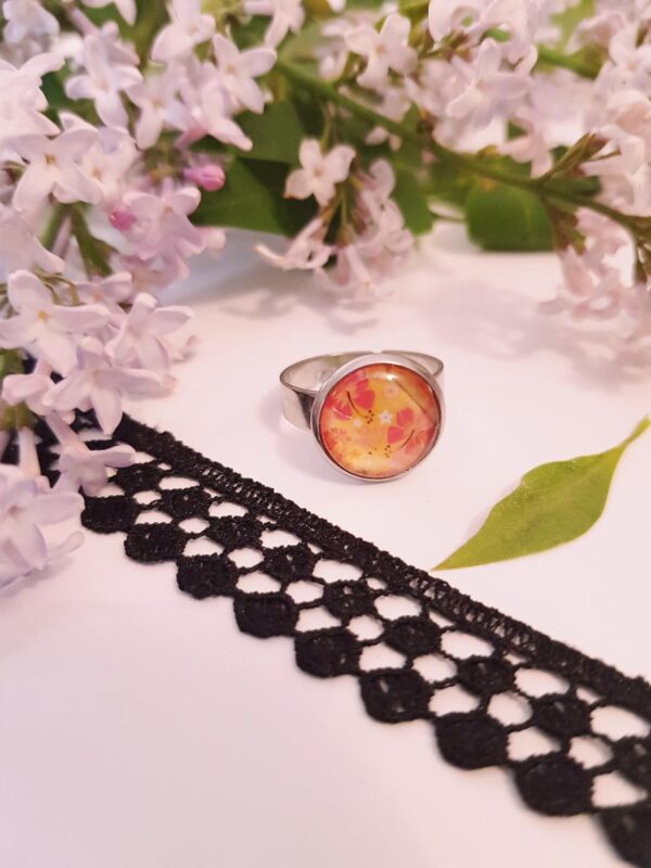 Bague inox - cabochon floral jaune et orangé