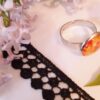 Bague inox - cabochon floral jaune et orangé