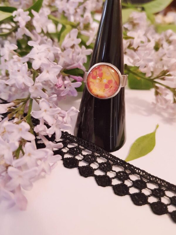 Bague inox - cabochon floral jaune et orangé