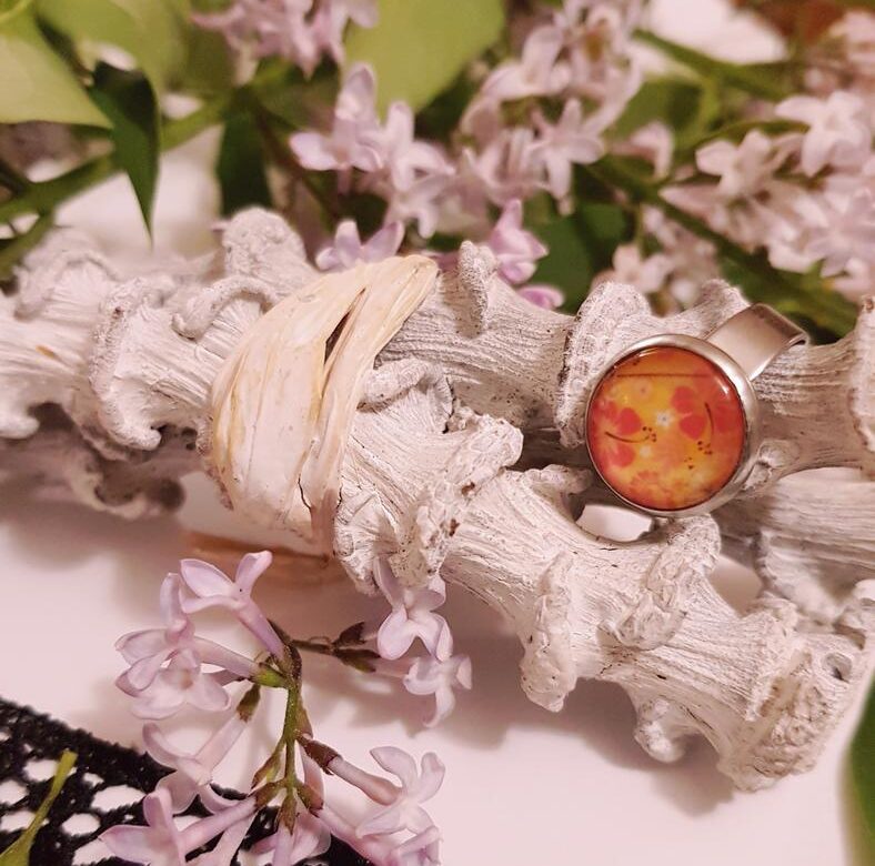 Bague inox - cabochon floral jaune et orangé