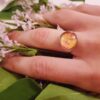 Bague inox - cabochon floral jaune et orangé