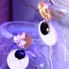 Boucles d'oreilles inox - Clou jaune résine et sequins blanc et noir