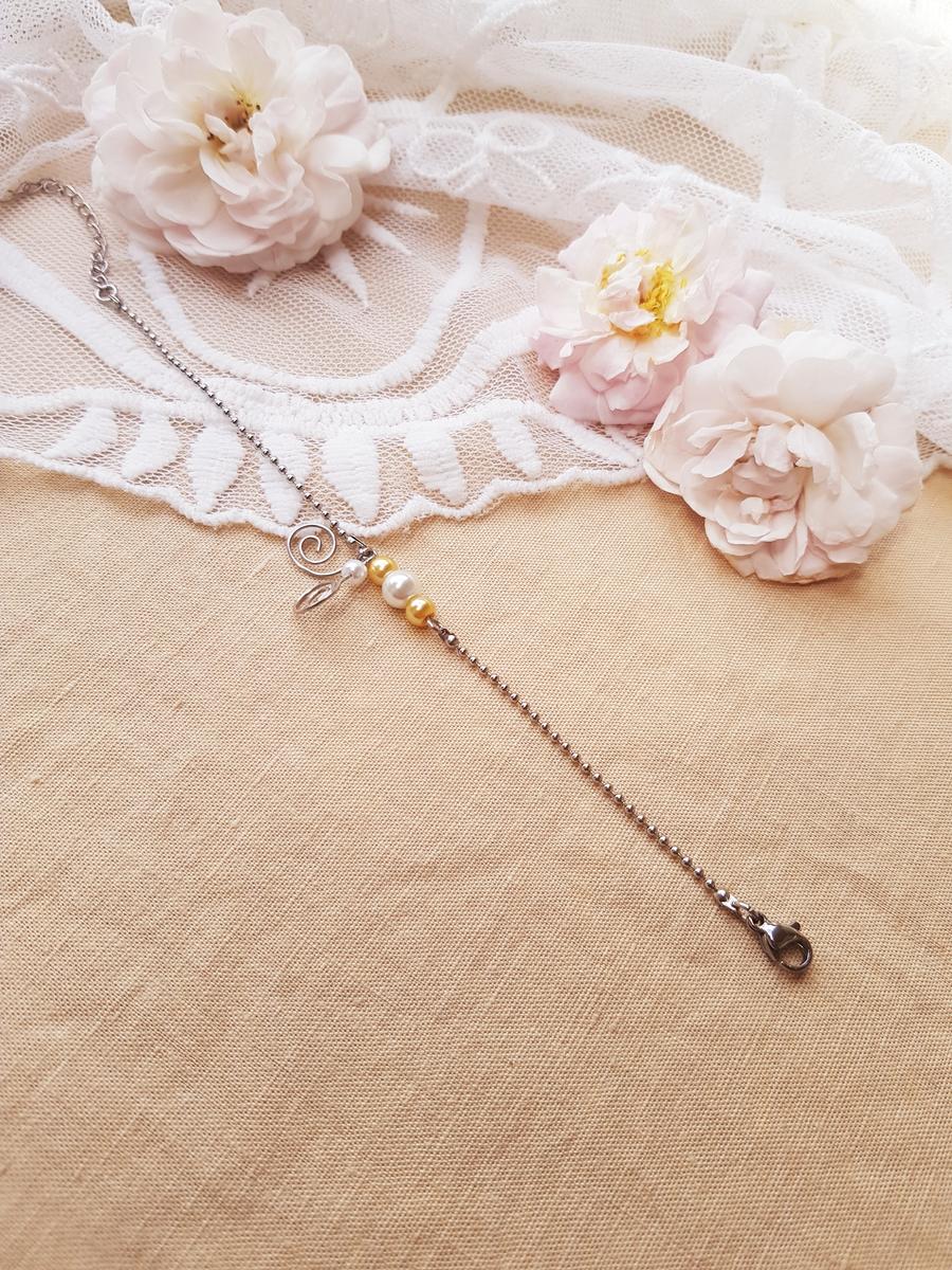 Bracelet inox mariage fait main - Arabesque et perles blanches et doré clair. Calino Crea Bracelet inox mariage fait main - Arabesque et perles blanches et doré clair. Calino Crea