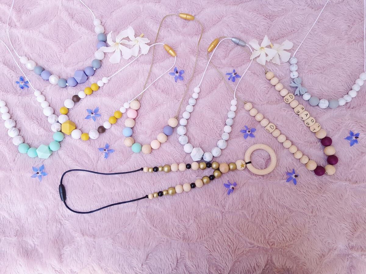 Bannière colliers d'allaitement et de portage fait main. Calino Crea