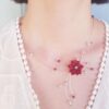 Collier inox mariage fait main - Perles et fleurs blanches et rouges. Calino Crea