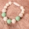 Bracelet d'allaitement et de portage - silicone blanc marbré et menthe