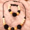 Collier et bracelet de portage et d'allaitement silicone fait main - beige, doré et crochet noir. Calino Crea