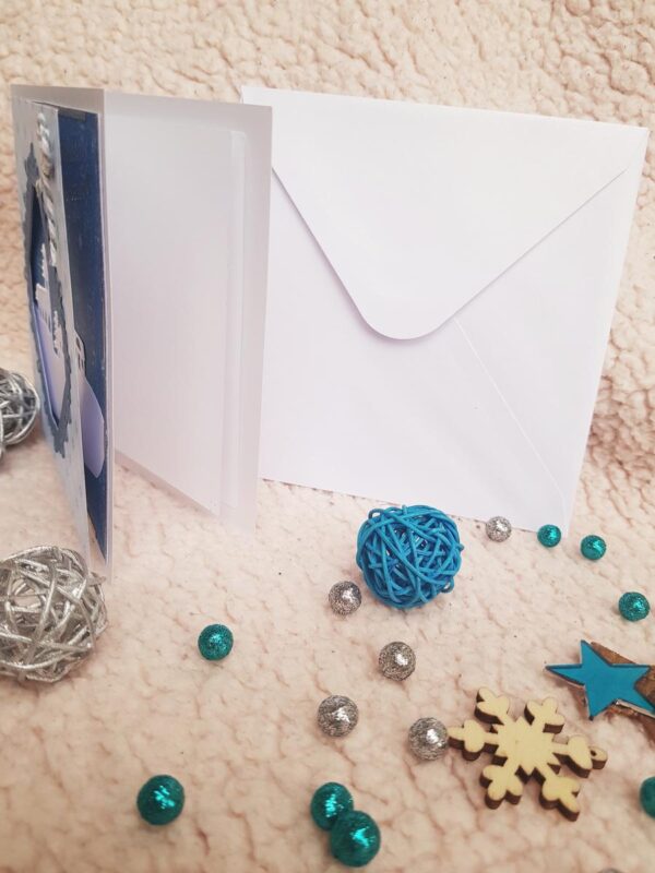 Carte artisanale “Meilleurs vœux” blanche et bleue avec paysage enneigé. Calino Créa