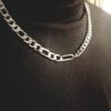 Collier asymétrique double maille gourmette/figaro argenté inox
