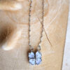 22501 - Collier argenté cœurs transformables – Fleur nacrée