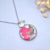 Collier en acier inoxydable avec fleurs séchées de Pensée rose et pierre naturelle de Citrine